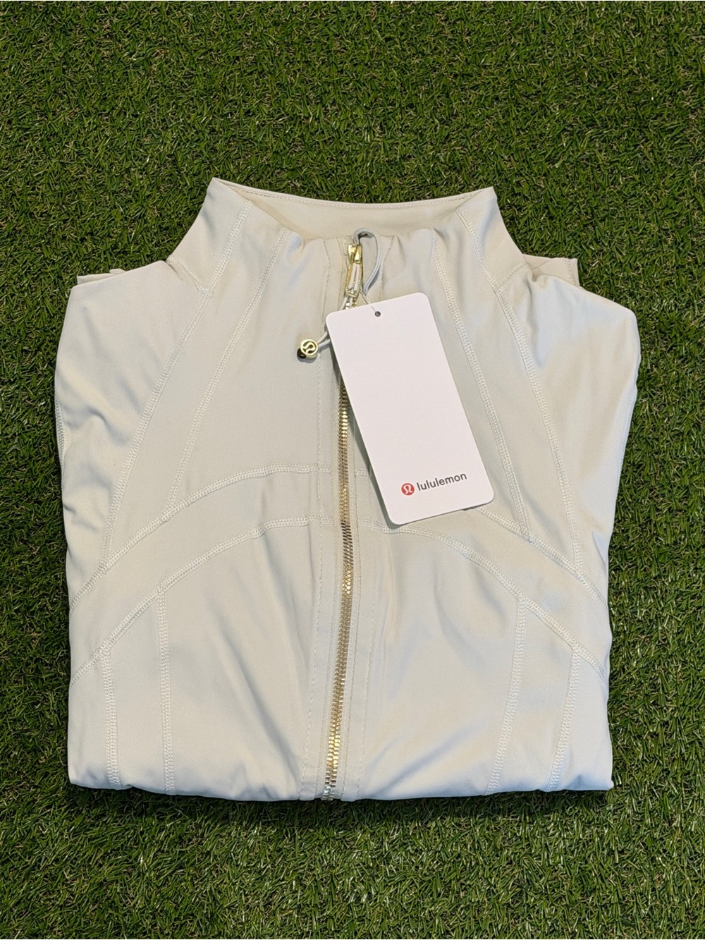 lululemon athletica Cream Bomber Jacket with Gold Zip Pull